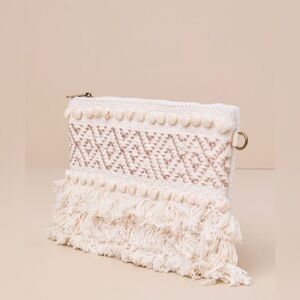 Lulu’s cream and rose gold clutch